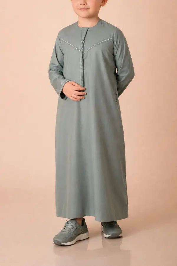 Premium Sage Green Emirati Kids Thobe with Contrast V-Stitch & Tassel - Image 2 - Ruby Online