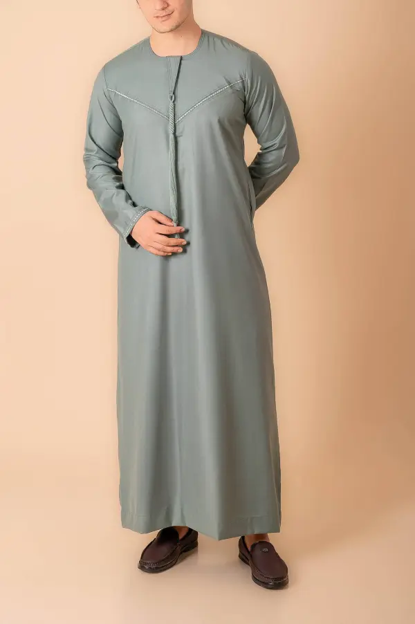 Premium Sage Green Emirati Tassel Thobe for Men with Silver Braided V-Panel – Modern Kandura Style