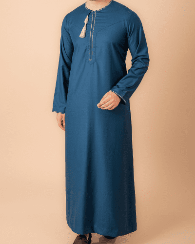 Teal blue Omani thobe with white geometric embroidery and tassel for men
