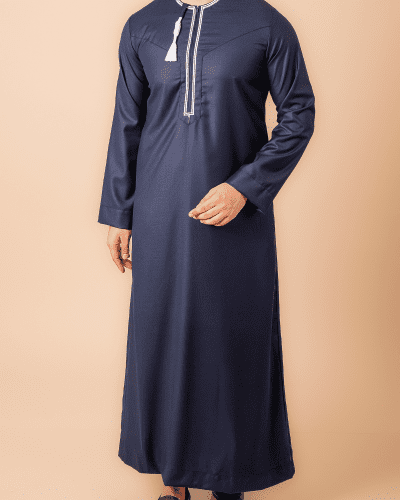 Navy blue Omani thobe with white geometric embroidery and tassel for men