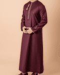 Maroon Omani thobe with white geometric embroidery and tassel for men
