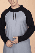 Men wearing light grey hooded thobe with black sleeves and hood minimalist Islamic wear