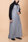 Men wearing light grey hooded thobe with black sleeves and hood minimalist Islamic wear