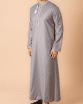 Light grey Omani thobe with white geometric embroidery and tassel for men