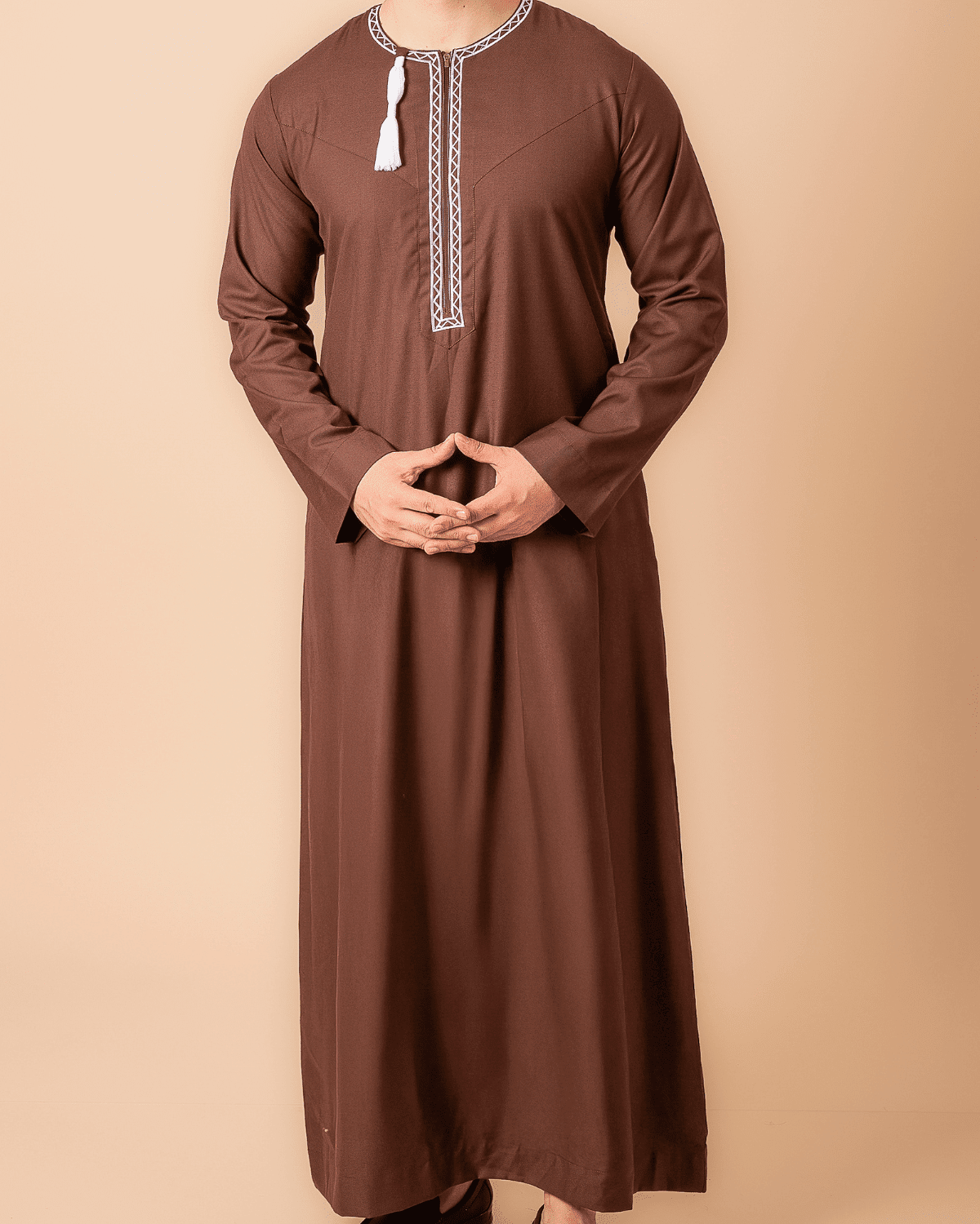 Coffee brown Omani thobe with white geometric embroidery and tassel for men