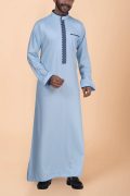 Light blue thobe with navy geometric embroidery strip and band collar for men