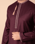 Maroon Omani thobe with white geometric embroidery and tassel for men