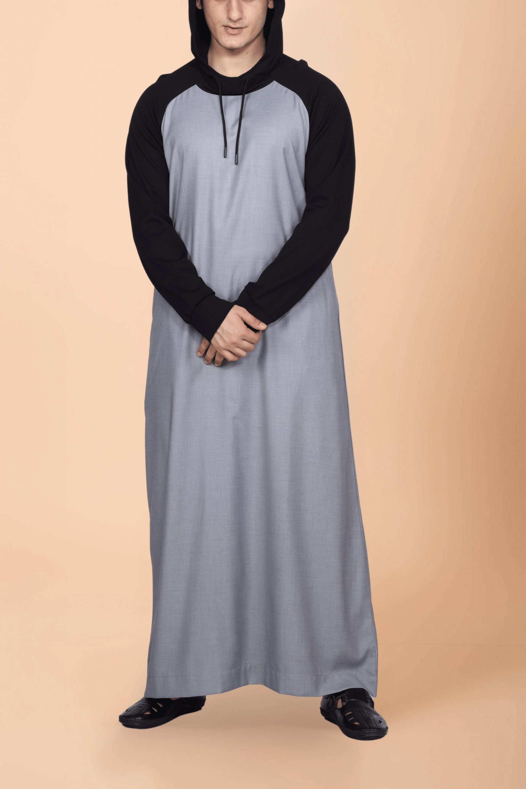 4Light Grey Hooded Thobe with Black Sleeves Men wearing light grey hooded thobe with black sleeves and hood minimalist Islamic wear