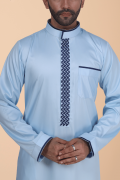 Light blue thobe with navy geometric embroidery strip and band collar for men