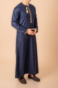 Navy blue Omani thobe with gold geometric embroidery and tassel for men