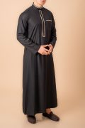 Jet black men’s thobe with gold geometric embroidered placket and band collar trim