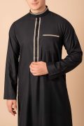 Jet black men’s thobe with gold geometric embroidered placket and band collar trim