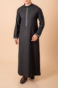Jet black men’s thobe with white geometric embroidered placket and cuff borders