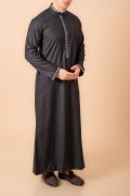 Jet black men’s thobe with white geometric embroidered placket and cuff borders