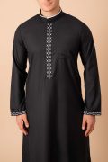 Jet black men’s thobe with white geometric embroidered placket and cuff borders