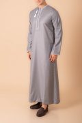 Light grey Omani thobe with white geometric embroidery and tassel for men