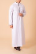 Men’s classic white thobe with black lattice embroidery strip and contrast cuff trim front view