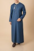 Teal blue Omani thobe with white geometric embroidery and tassel for men