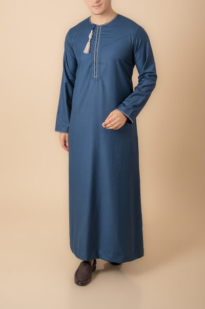 Teal blue Omani thobe with white geometric embroidery and tassel for men