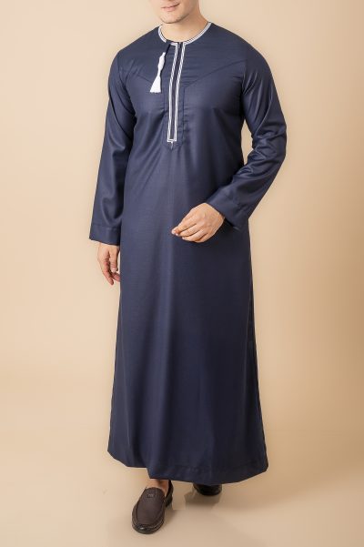 Navy blue Omani thobe with white geometric embroidery and tassel for men