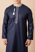 Navy blue Omani thobe with white geometric embroidery and tassel for men