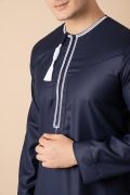 Navy blue Omani thobe with white geometric embroidery and tassel for men