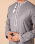 Light grey Omani thobe with white geometric embroidery and tassel for men