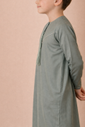 Kids sage green Emirati thobe with V panel contrast stitch and tassel