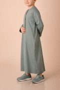 Kids sage green Emirati thobe with V panel contrast stitch and tassel
