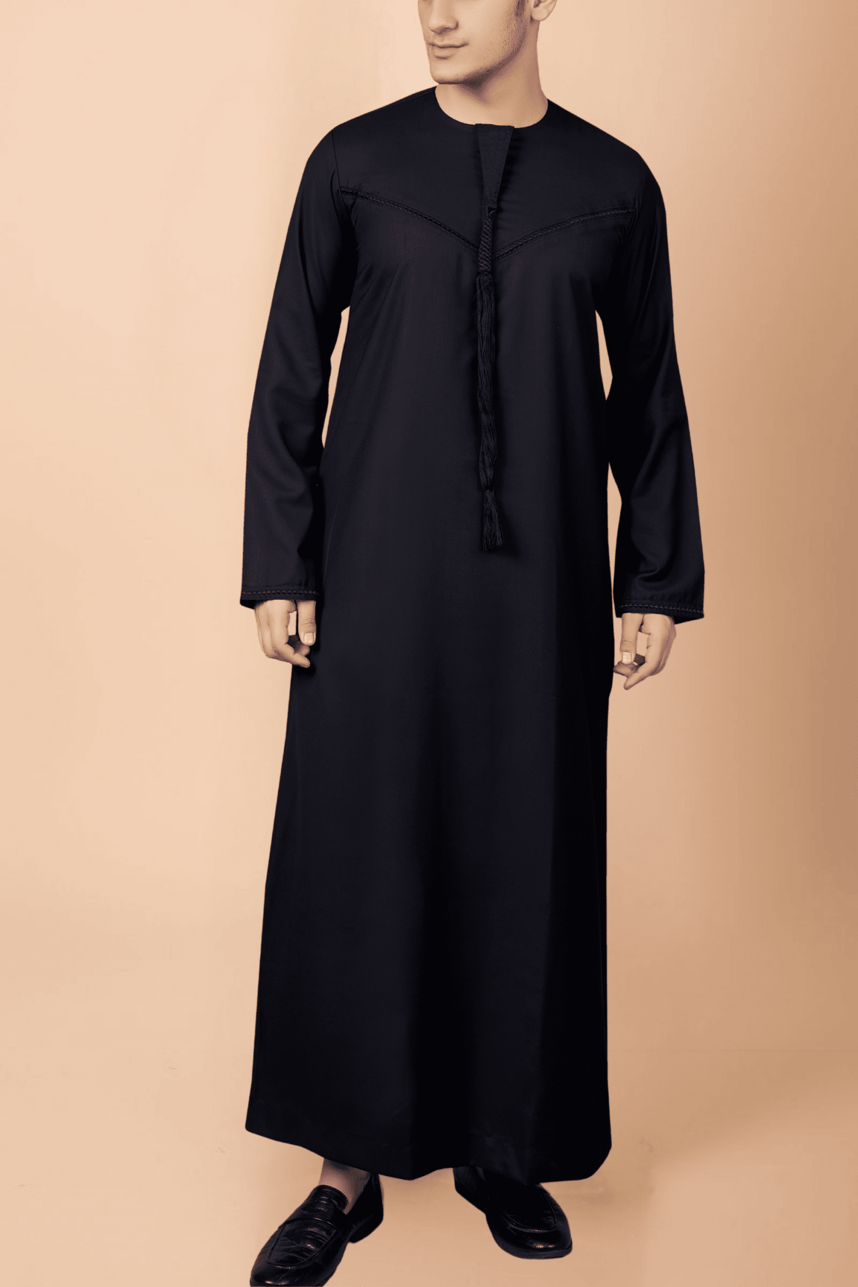 men black emirati tassel thobe with chevron stitched chest panel and front tassel kandura