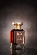 Rifaah Oud Al Khaas extrait de parfum ruby red bottle luxury oud perfume with gold detailing