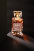 Rifaah Oud Asrar extrait de parfum amber oud fragrance in crystal glass bottle with gold detailing