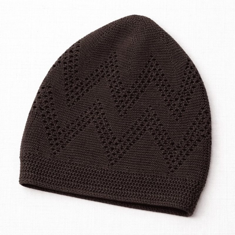 dark brown turkish sufi knitted prayer cap with geometric open work pattern and ribbed edge