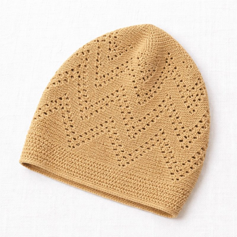 beige turkish sufi knitted prayer cap with geometric openwork pattern and ribbed edge