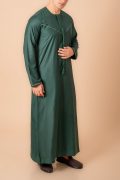 deep emerald green emirati tassel thobe for men with light sage braided chest panel and front tassel kandura