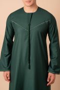 deep emerald green emirati tassel thobe for men with light sage braided chest panel and front tassel kandura