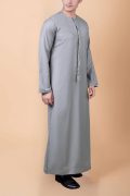 Light ash grey Emirati tassel thobe with zigzag embroidered chest and sleeve detailing