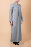 Light ash grey Emirati tassel thobe with zigzag embroidered chest and sleeve detailing