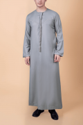Light ash grey Emirati tassel thobe with zigzag embroidered chest and sleeve detailing