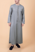 Light ash grey Emirati tassel thobe with zigzag embroidered chest and sleeve detailing