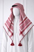 Wine red traditional Arab shemagh keffiyeh scarf with tassels on mannequin wearing white thobe.