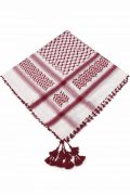 Wine red traditional Arab shemagh keffiyeh scarf with tassels on mannequin wearing white thobe.