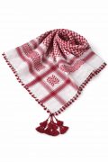 Wine red traditional Arab shemagh keffiyeh scarf with tassels on mannequin wearing white thobe.