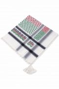 Traditional white keffiyeh shemagh scarf featuring red, green and black woven patterns with decorative tassel edges worn with a white thobe.
