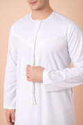 Pure white Emirati tassel thobe with tonal embroidered chest and sleeve detailing