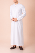 Pure white Emirati tassel thobe with tonal embroidered chest and sleeve detailing