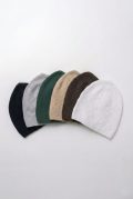 Six assorted colors of men's diamond-pattern knit Muslim prayer caps arranged neatly on a clean background.
