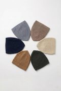 Six assorted colors of men's diamond-pattern knit Muslim prayer caps arranged neatly on a clean background.
