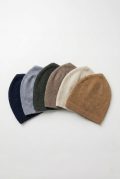 Six assorted colors of men's diamond-pattern knit Muslim prayer caps arranged neatly on a clean background.
